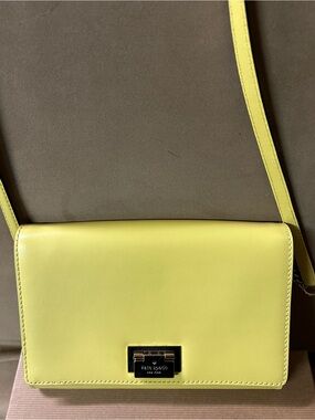 Kate Spade yellow Crossbody Bag with Gold Hardware.